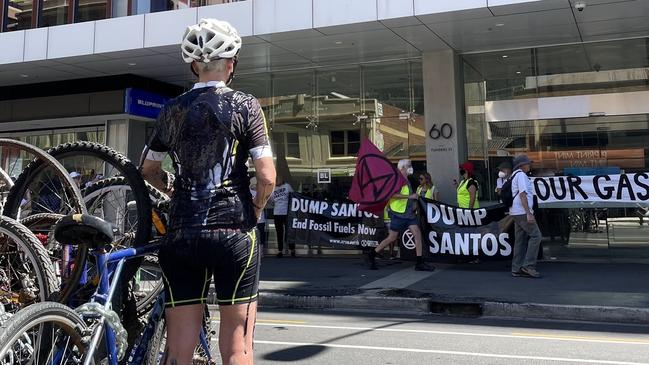 Extinction Rebellion protestors glued themselves to roads, demanding a major event drop Santos as their sponsor. Picture: Twitter