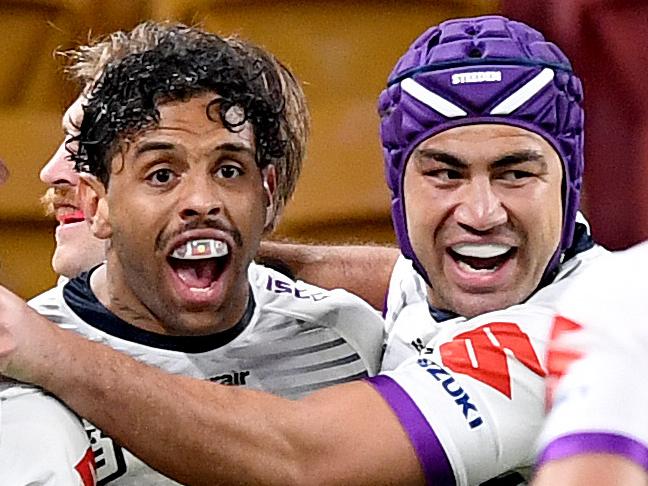 BRISBANE, AUSTRALIA - JULY 24: Josh Addo-Carr of the Storm celebrates scoring a try during the round 11 NRL match between the Brisbane Broncos and the Melbourne Storm at Suncorp Stadium on July 24, 2020 in Brisbane, Australia. (Photo by Bradley Kanaris/Getty Images)