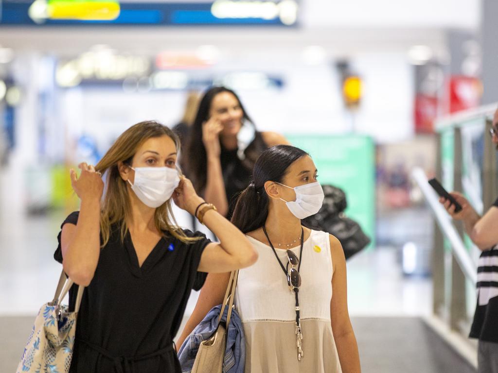 In-bound passengers from Adelaide at Sydney Airport on Wednesday. Picture: Jenny Evans/Getty Images