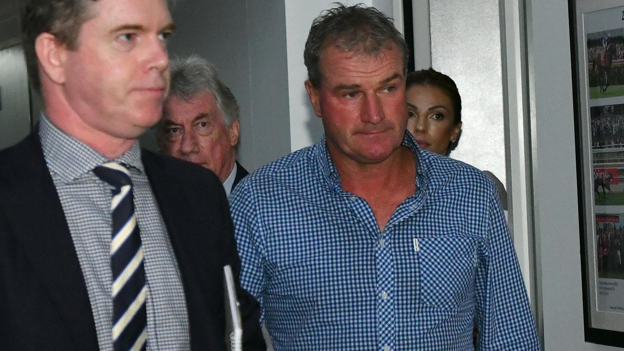 Trainer Darren Weir is seen leaving the Racing Appeals and Disciplinary Board in February.