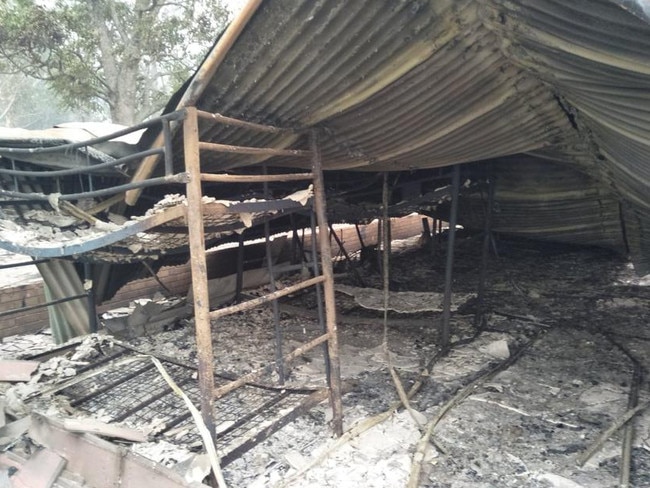 What remains of a student dormitory at Scots College Glengarry campus, with bedframes still standing.