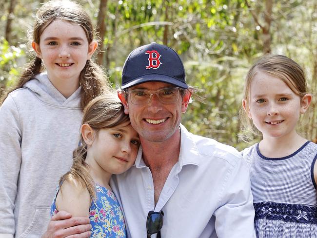 Family man... Pictured with daughters Charlotte 12, Amelia 10 and Annabelle 7. Picture: Tim Hunter.