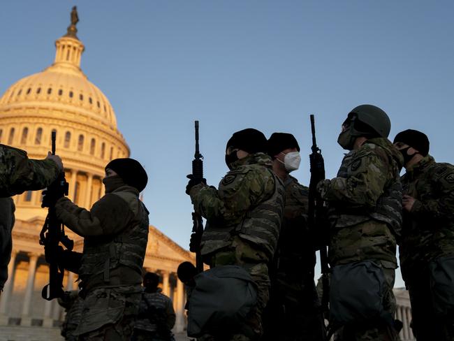 Weapons are distributed to members of the National Guard outside the US Capitol. Picture: AFP