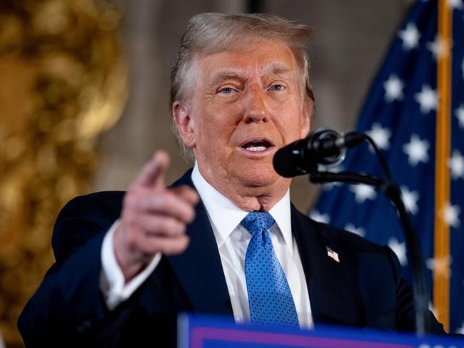 PALM BEACH, FLORIDA - DECEMBER 16: U.S. President-elect Donald Trump speaks at a news conference at Trump's Mar-a-Lago resort on December 16, 2024 in Palm Beach, Florida. In a news conference that went over an hour, Trump announced that SoftBank will invest over $100 billion in projects in the United States including 100,000 artificial intelligence related jobs and then took questions on Syria, Israel, Ukraine, the economy, cabinet picks, and many other topics.   Andrew Harnik/Getty Images/AFP (Photo by Andrew Harnik / GETTY IMAGES NORTH AMERICA / Getty Images via AFP)