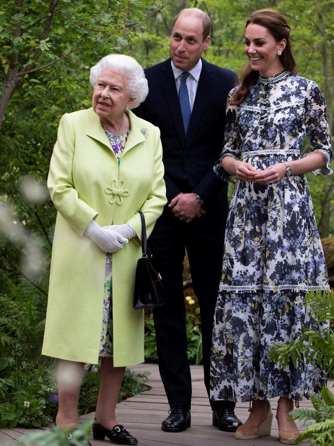 The Duchess of Cambridge (shows the Queen and Prince William around the 'Back to Nature Garden' garden, that she designed along for the 2019 Chelsea Flower Show in London. Picture: AFP.