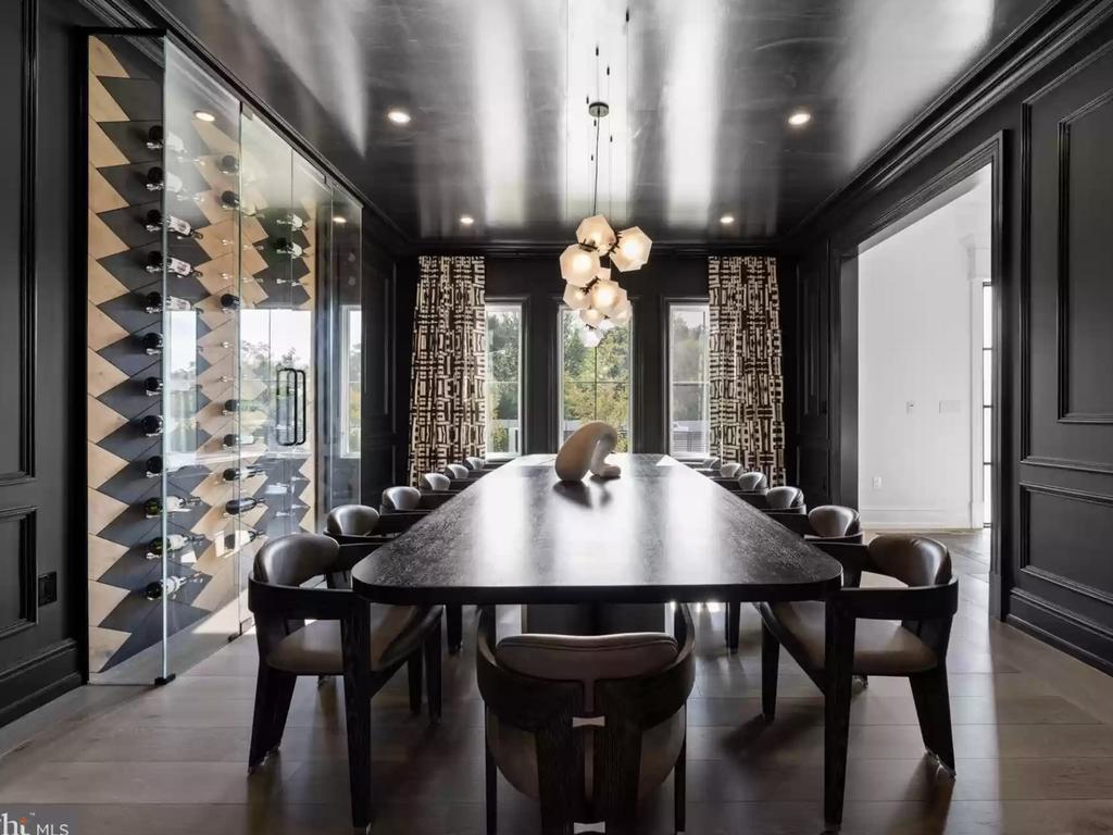 The dining room has a feature wine wall. Picture: Realtor