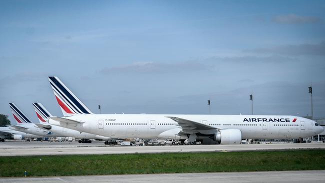 Air France planes are parked on the tarmac of the Roissy-Charles de Gaulle airport near Paris. Picture: AFP