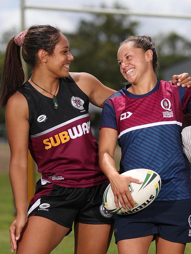 Qld women's halfback and teacher Cobie-Jane Morgan (second from left) with Marsden State School student Ana Drotini Pic Peter Wallis