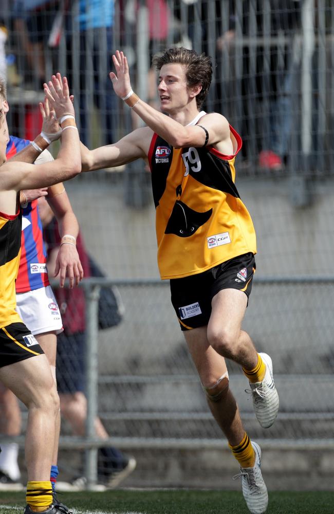 Sam Sturt celebrates after kicking a goal in the TAC Cup grand final.