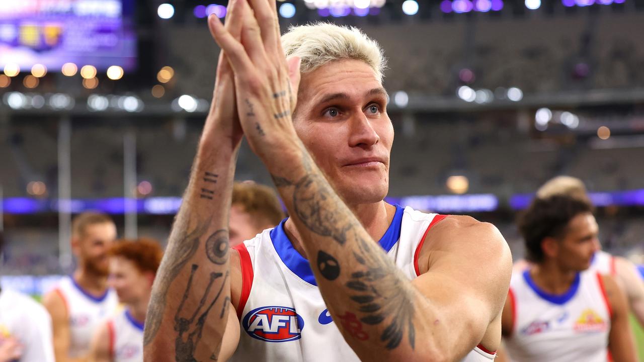 Bulldogs Rory Lobb acknowledges supporters while walking from the field. Picture: Paul Kane