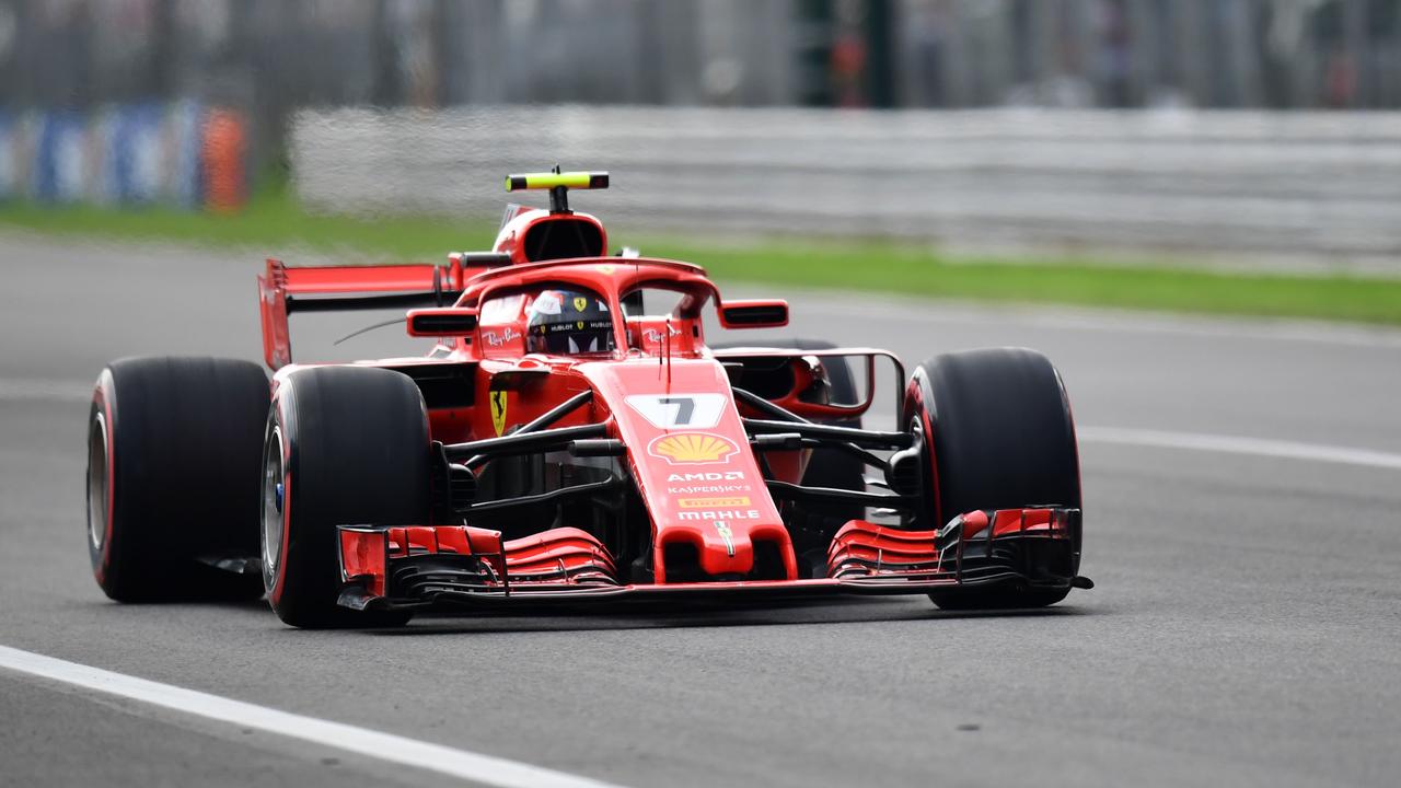 Ferrari's Finnish driver Kimi Raikkonen wins pole position at the Italian GP.