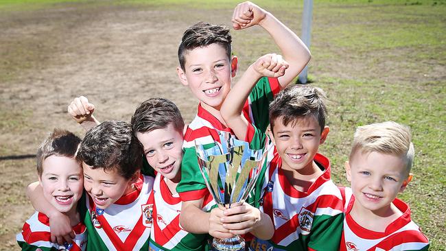 Lennox Ring, Charlie Moore, Rex Howes, Axel Howes, Zac Howes, Mason Peters celebrate after the South Sydney Seagulls won the South Sydney District Junior Club Championship with the most number of overall points. Picture: AAP IMAGE/ Danny Aarons