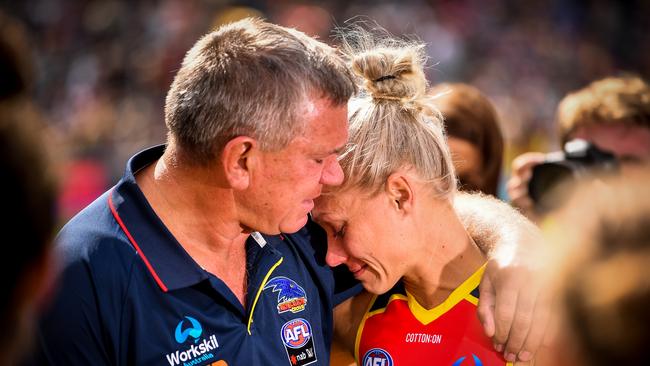 Erin Phillips and her father, Greg, embrace after the AFLW Grand Final match between the Adelaide Crows and the Carlton Blues at Adelaide Oval on March 31, 2019. Picture: Daniel Kalisz / Getty Images