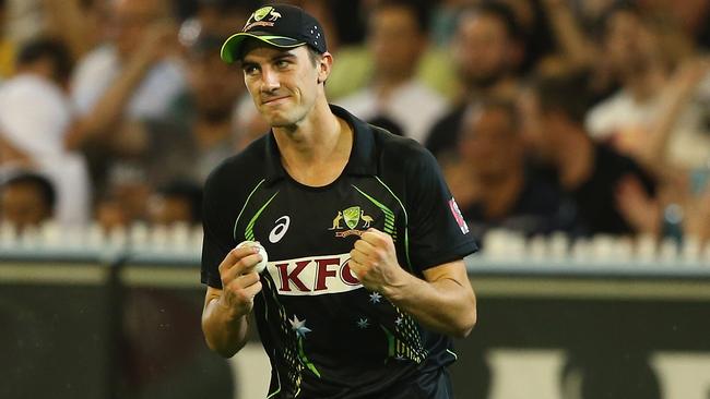 MELBOURNE, AUSTRALIA - NOVEMBER 07: Patrick Cummins of Australia celebrates after he caught out David Miller of South Africa during game two of the International Twenty20 Series between Australia and South Africa at Melbourne Cricket Ground on November 7, 2014 in Melbourne, Australia. (Photo by Robert Cianflone/Getty Images)