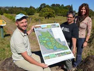 Showing off plans for a constructed wetland at Slaters Creek in North Lismore are (l-r) Lismore City Council’s environmental strategies coordinator, Nick Stephens, Aunty Thelma James and the council’s catchment management officer, Vanessa Tallon.High resolution image available on request.