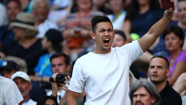 A spectator interrupts the second round match between Nick Kyrgios of Australia and Viktor Troicki of Serbia. Picture: Getty