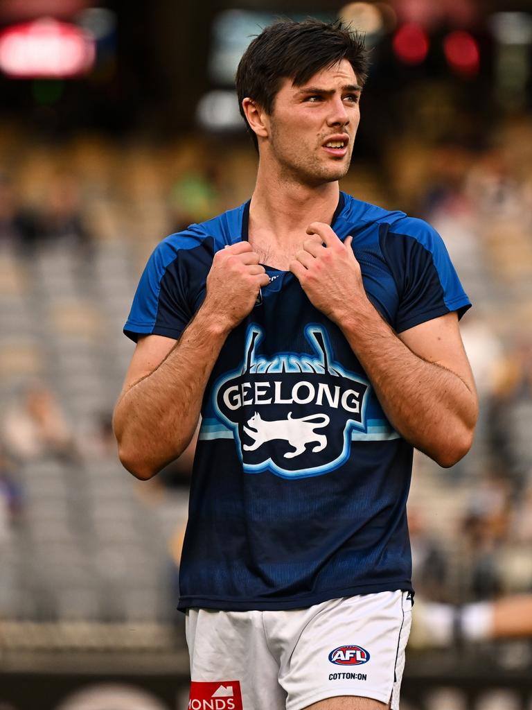 Oliver Henry warms up ahead of the Cats’ game against West Coast in round 12. Picture: Daniel Carson/AFL Photos via Getty Images