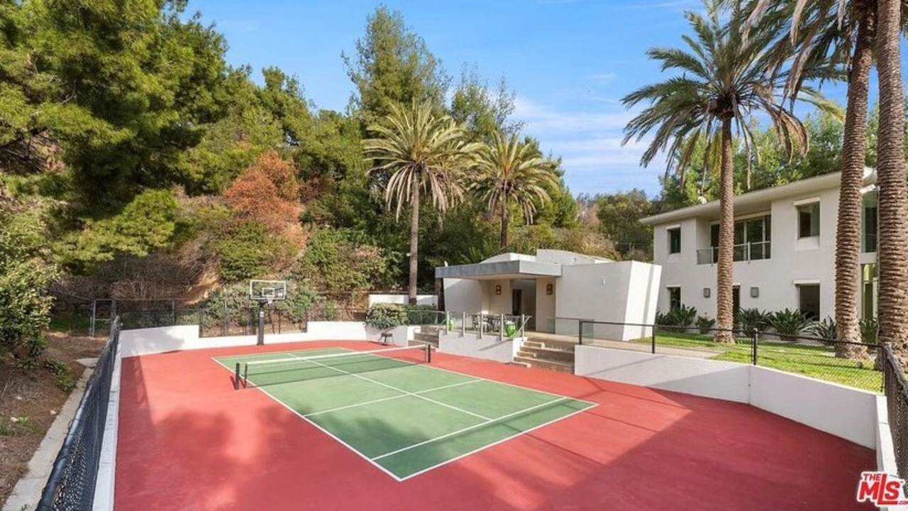 The enormous property boasts its own paddle tennis court. Picture: Realtor