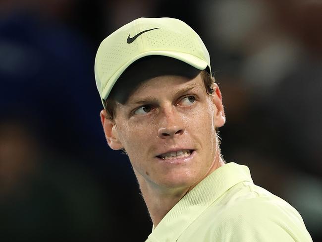 MELBOURNE, AUSTRALIA - JANUARY 22: Jannik Sinner of Italy celebrates winning the match point against Alex de Minaur of Australia in the Men's Singles Quarterfinal during day 11 of the 2025 Australian Open at Melbourne Park on January 22, 2025 in Melbourne, Australia. (Photo by Cameron Spencer/Getty Images)