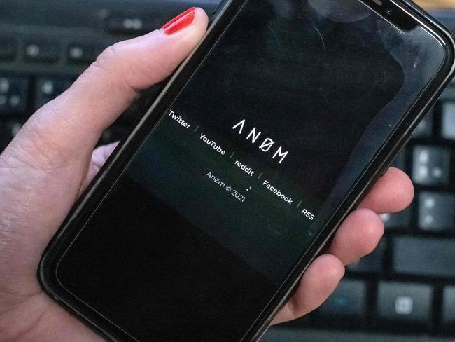 The ANoM app appears on the screen of a smartphone in Paris, on June 8, 2021. - Some 250 people were arrested in Sweden and Finland in the global sting on organised crime, authorities said on June 8, 2021, using phones planted by the US FBI, law enforcement officers were able to read the messages of global underworld figures in around 100 countries as they plotted drug deals, arms transfers and gangland hits on the compromised ANOM devices. (Photo by Olivier MORIN / AFP)