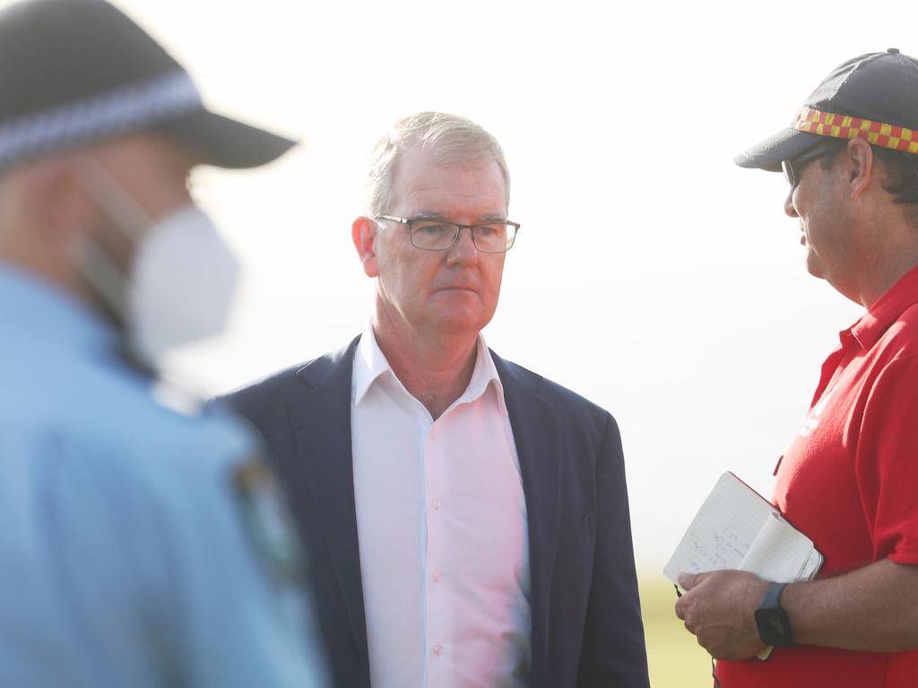 Maroubra MP Michael Daley speaks to emergency personnel. Picture: John Grainger