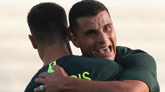 DUBAI, UNITED ARAB EMIRATES - DECEMBER 30:  Chris Ikonomidis and Andrew Nabbout of Australia celebrates their second goal during the International Friendly match between Australia and Oman at Maktoum Bin Rashid Al Maktoum Stadium on December 30, 2018 in Dubai, United Arab Emirates.  (Photo by Francois Nel/Getty Images)