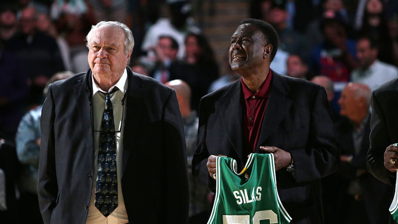 Legendary Boston Celtics Tom Heinsohn (L) and Paul Silas.