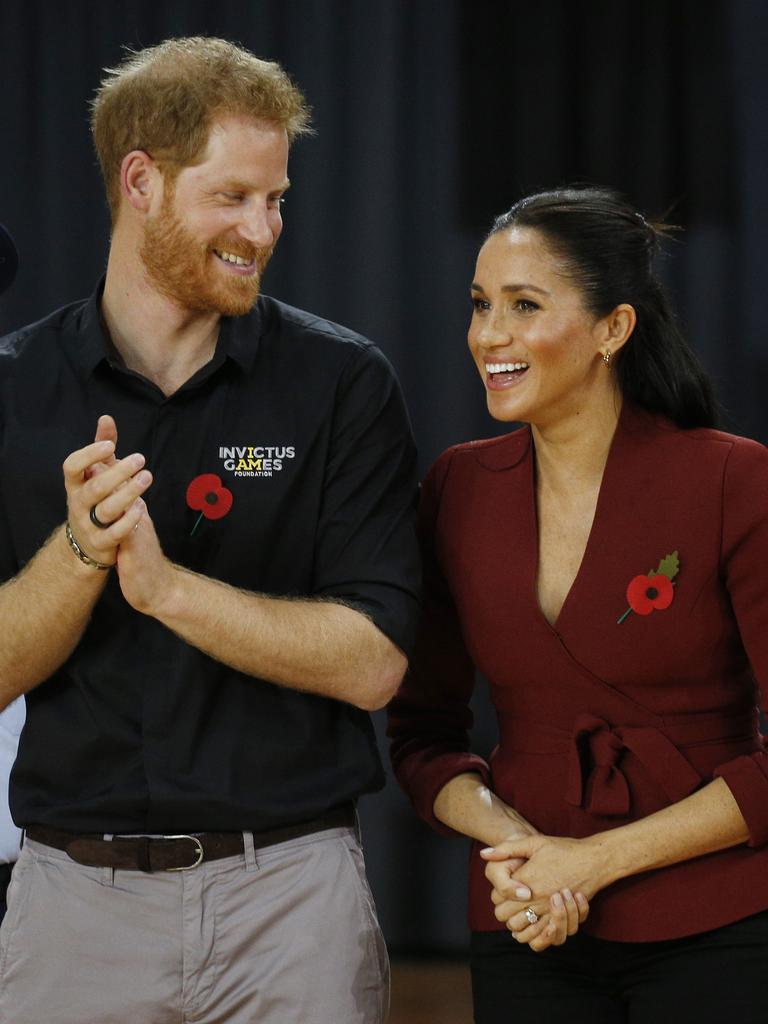 Prince Harry and Meghan at the Invictus Games Wheelchair Basketball in Sydney in 2018. Picture: Richard Dobson