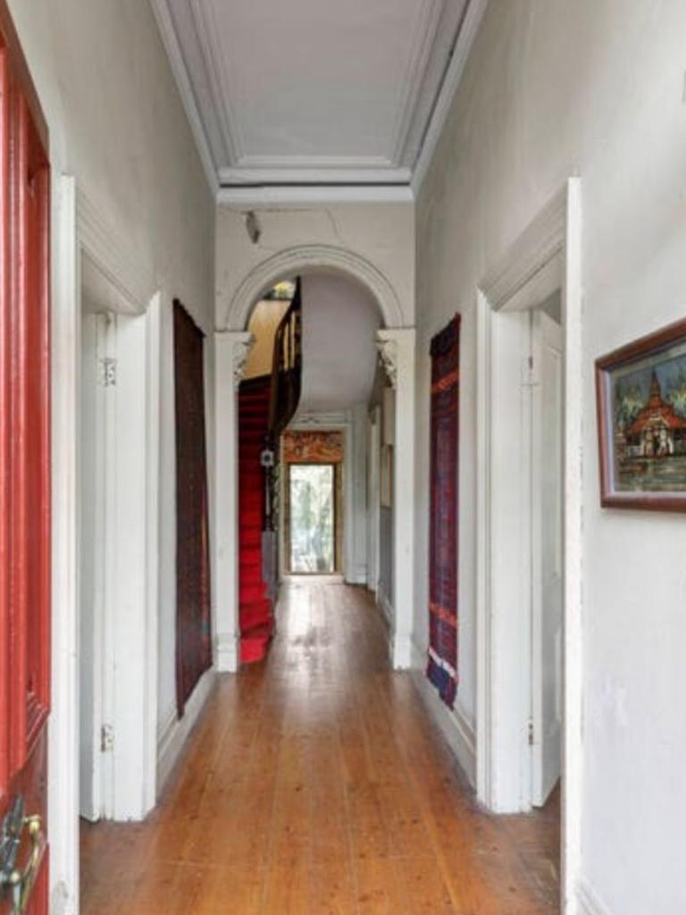 Cracks are evident down the Victorian residence's grand hallway. Picture: realestate.com.au