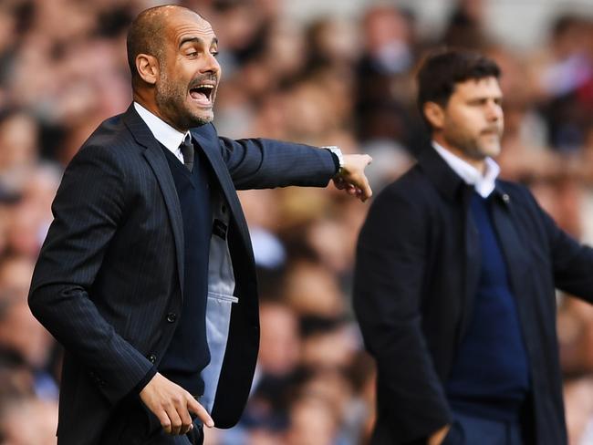 LONDON, ENGLAND - OCTOBER 02: Josep Guardiola, Manager of Manchester City reacts next to Mauricio Pochettino, manager of Tottenham Hotspur during the Premier League match between Tottenham Hotspur and Manchester City at White Hart Lane on October 2, 2016 in London, England. (Photo by Shaun Botterill/Getty Images)