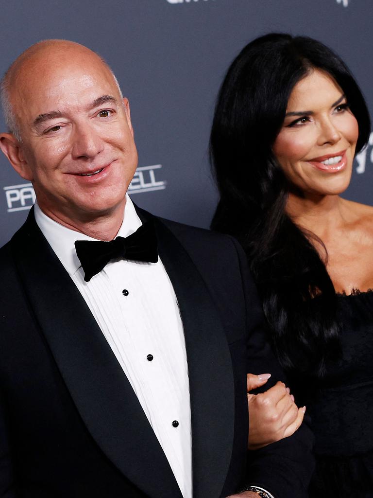 Jeff Bezos and Lauren Sanchez made the announcement. Picture: Michael Tran / AFP