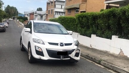 This image was taken of a car that was parked near the East St laneway. A metal star-picket fence post can be seen protruding from the radiator, under the (obscured) licence plate. The image was taken after Shelley Threfall returned home to find her side fence smashed. 