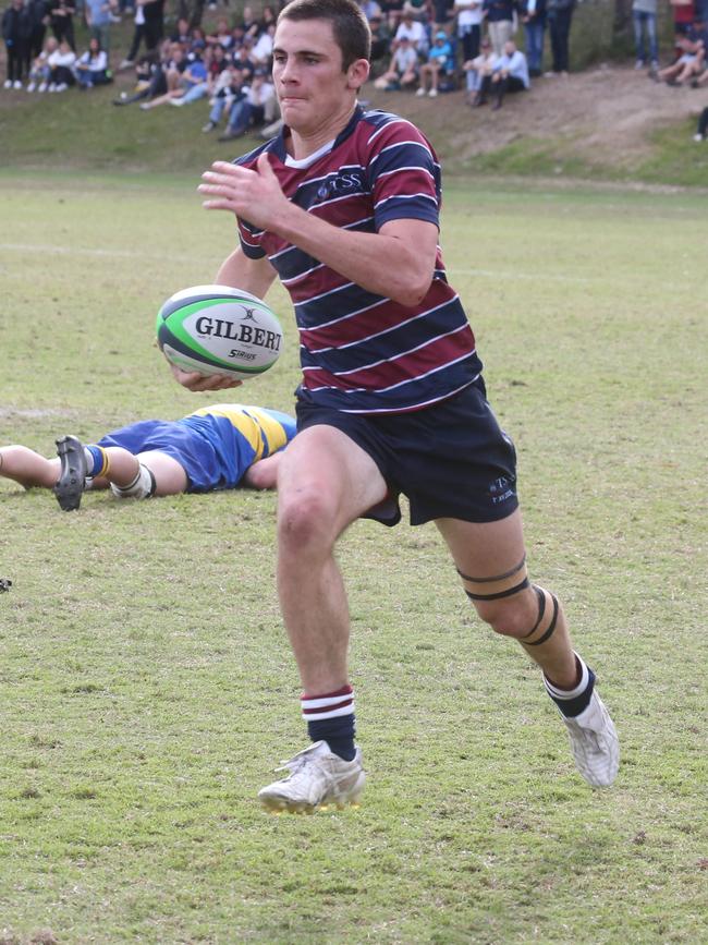 The Southport School fullback strides away in round 3. Picture by Richard Gosling