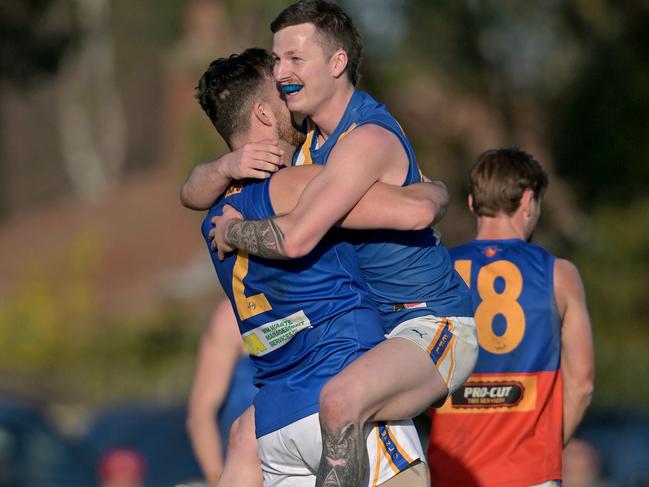 EFNL: Heathmont’s Liam Douglas celebrates a goal with Campbell Evans. Picture: Andy Brownbill