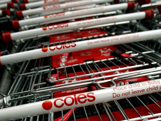 11 Mar 2004 Generic - stack of empty Coles supermarket shopping trolleys, in Sydney. shop shops logo logos