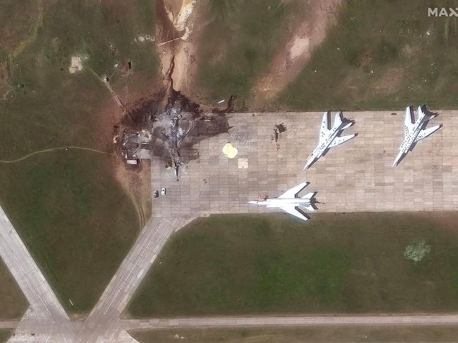 This satellite picture courtesy of Maxar Technologies shows a destroyed Tupolev Tu-22 aircraft at Belaya Airbase in the Irkutsk Oblast. Picture: AFP