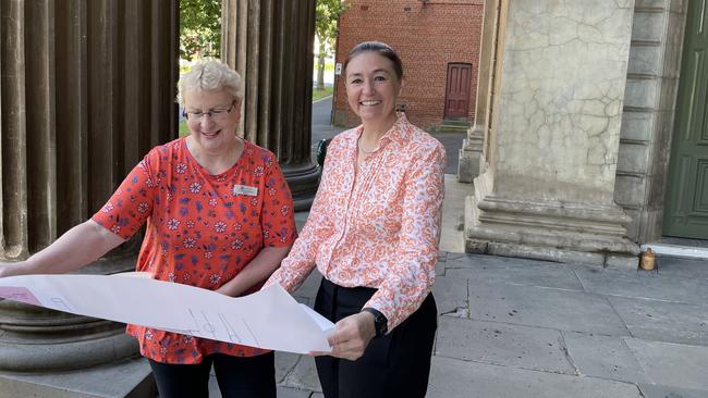 Bendigo Mayor Andrea Metcalf and Bendigo events manager Julie Amos outside The Capital theatre, Bendigo, holding design plans.