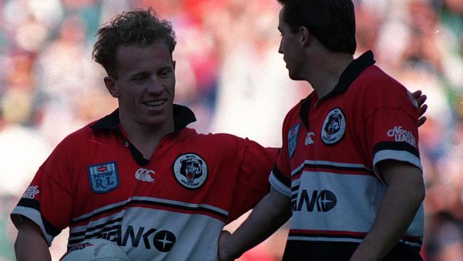 Mark Soden celebrates his try with Jason Taylor.