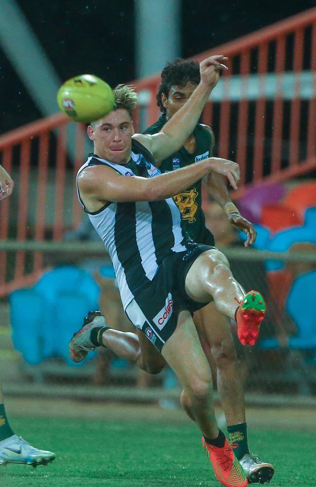 Baxter Mensch kicks into space for Palmerston. Picture: Glenn Campbell