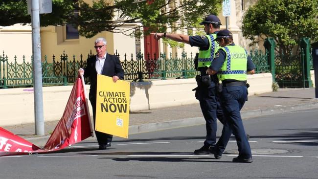 Pastor Jeff McKinnon and an unknown protester at the intersection of St John and Paterson St, February 27, 2023. Picture: XRNT/ Facebook