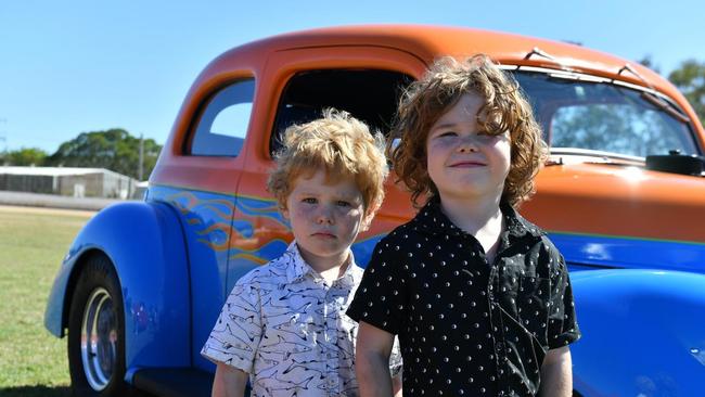 Thomas (4) and Sebastian (5) Reynolds at hot rods for the homeless at the Gladstone showgrounds on October 26.