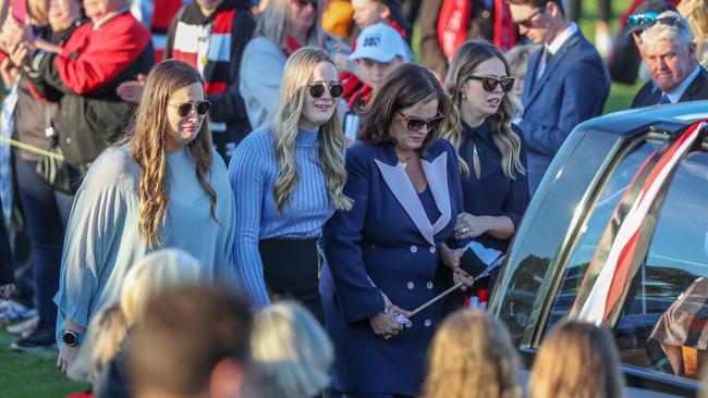 Danny Frawley's wife Anita walks behind his hearse with their daughters. Picture: Alex Coppel