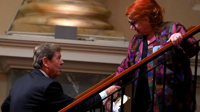 Ray Martin helps Quentin Kenihan’s mother Kerry Kenihan after she spoke at Quentin’s memorial service. Picture: AAP / Kelly Barnes