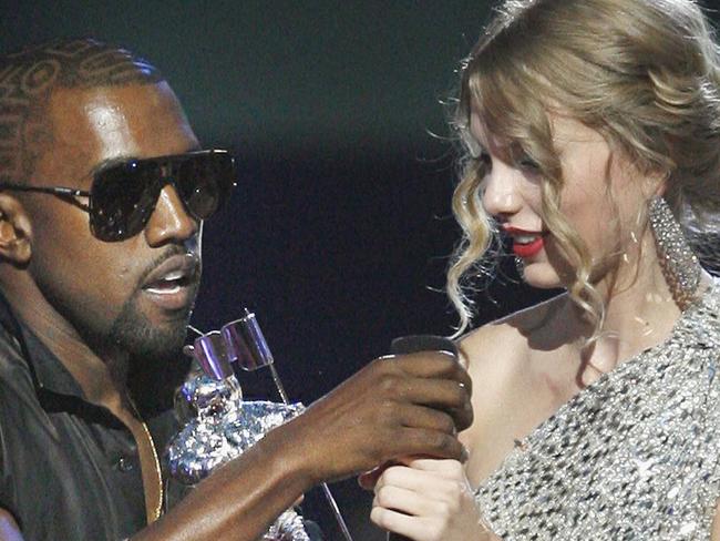 Singer Kanye West takes the microphone from singer Taylor Swift as she accepts the ''Best Female Video'' award during the MTV Video Music Awards on in New York, USA 13 Sep 2009.