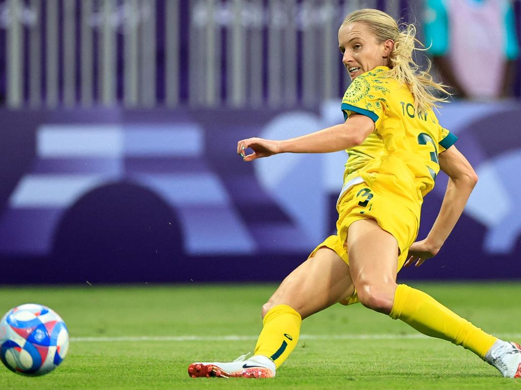 Australia's midfielder #03 Kaitlyn Torpey runs with the ball during the match. Picture: Valery Hache/AFP