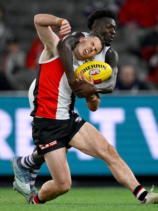 Michael Frederick catches Jack Higgins high.