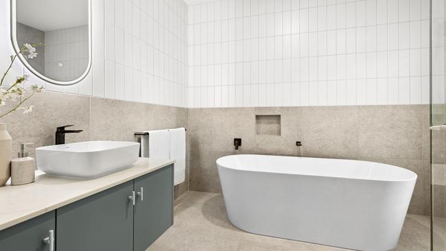 A deep freestanding bath is a key feature of the main bathroom.