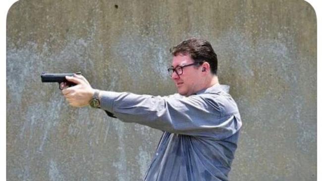 Photo from George Christensen MP's Facebook page of him shooting a handgun.