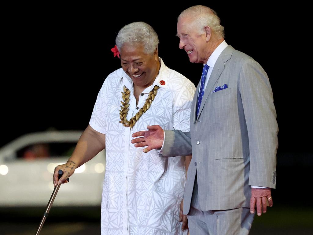 King Charles III walks with Prime Minister of Samoa Fiame Naomi Mata'afa after arriving at Faleolo International Airport. Picture: Getty Images