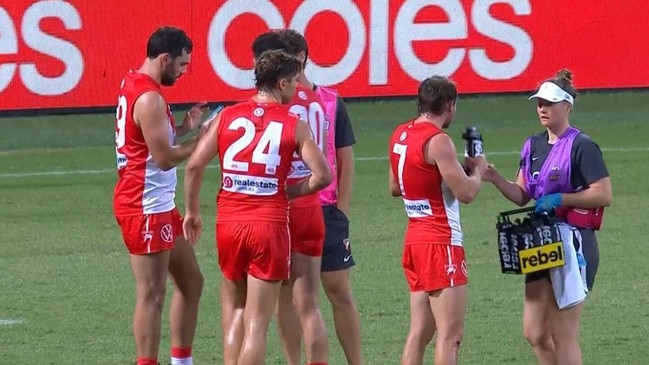 Swans defender Paddy McCartin using a mobile phone for medical purposes during an AFL match. Picture: Channel Seven